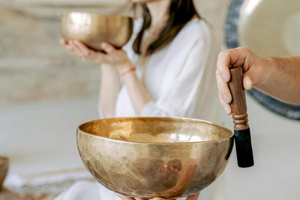 pexels-photo-6252095-6252095 A serene meditation session with singing bowls, promoting peace and healing.